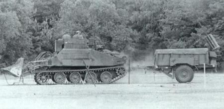 CET with a Giant Viper mine clearing trailer in tow